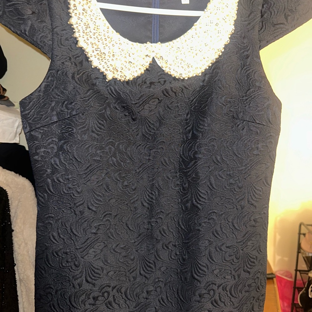 Elegant Black Dress with Embellished Collar